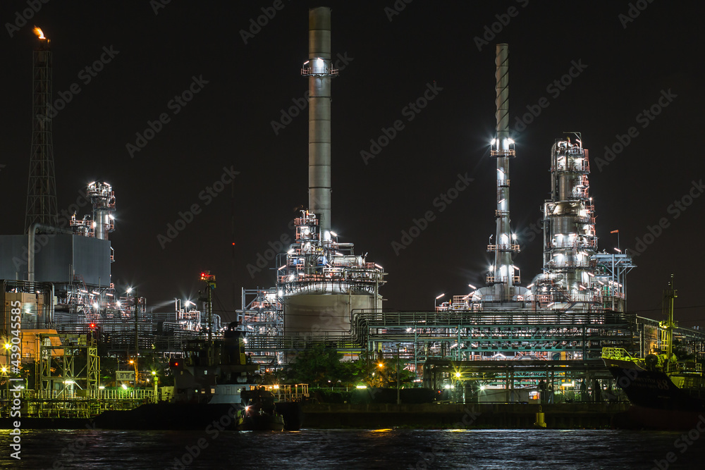 Oil refinery on water side front