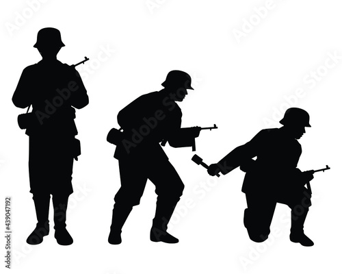 Fototapeta Set of German soldiers with a gun weapon during world war 2 silhouette vector on