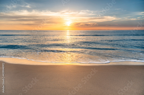 USA, Florida, Boca Raton, Sun rising above sea photo