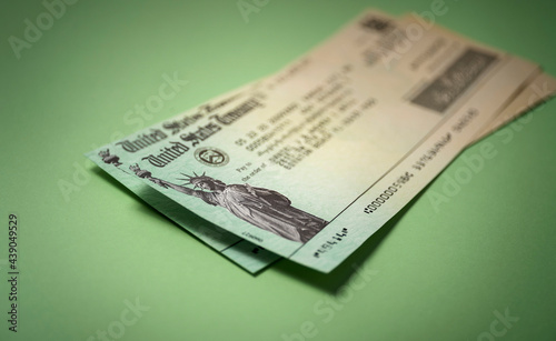Studio shot of US government check for stimulus money photo