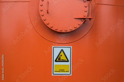 Fototapeta Naklejka Na Ścianę i Meble -  Tank orange confined space entry