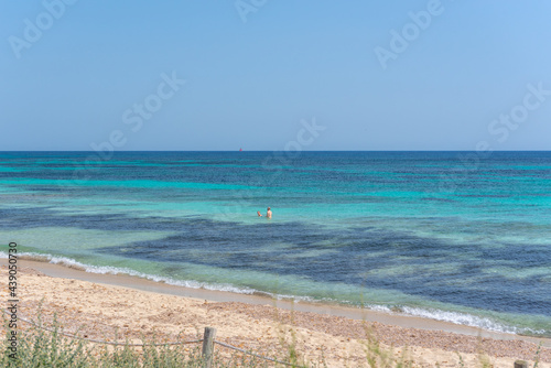 People on Migjorn beach in Formentera in Spain in Times of COvid 19.