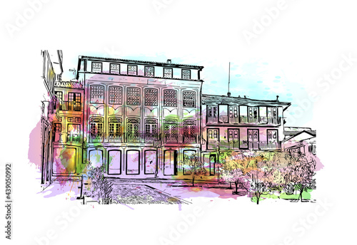 Building view with landmark of Guimaraes is a city in northern Portugal. Watercolor splash with hand drawn sketch illustration in vector.