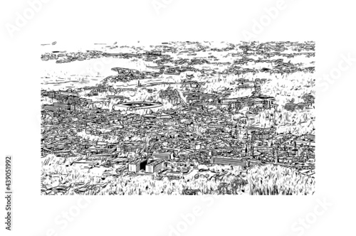 Building view with landmark of Guimaraes is a city in northern Portugal. Hand drawn sketch illustration in vector.