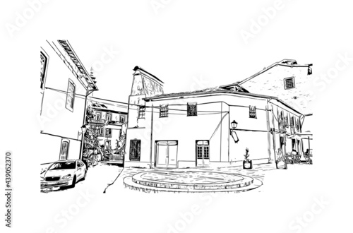 Building view with landmark of Guimaraes is a city in northern Portugal. Hand drawn sketch illustration in vector.