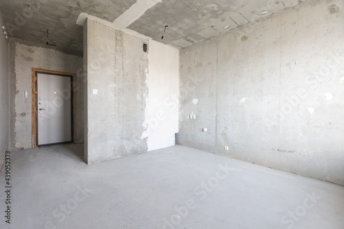 interior of the apartment without decoration in gray colors © gluschenkoart