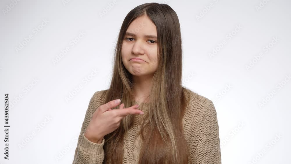 Confident girl making gesture and showing she is proud of herself Confident girl making gesture and showing she is proud of herself