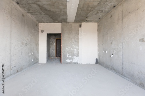 interior of the apartment without decoration in gray colors © gluschenkoart