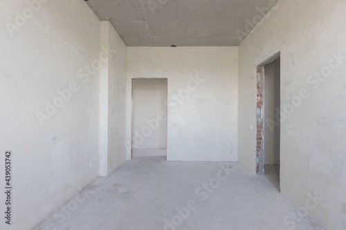 interior of the apartment without decoration in gray colors