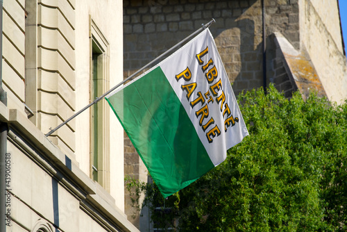 Flag of canton de vaud at the old town of Payerne. Photo taken June 11th, 2021, Zurich, Switzerland.