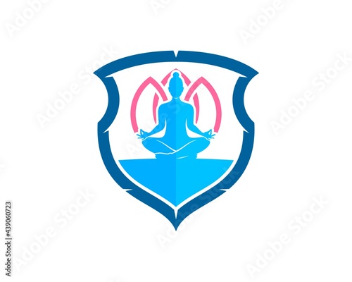 Abstract shield with women yoga and lotus flower behind