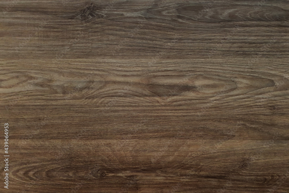 Naklejka premium Brown wooden background. Wood dark abstract texture.