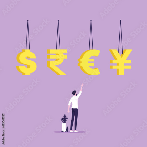International currencies economy concept, Businessman pointing at and choosing gold International currencies symbol, euro, dollar, yen and Ruble