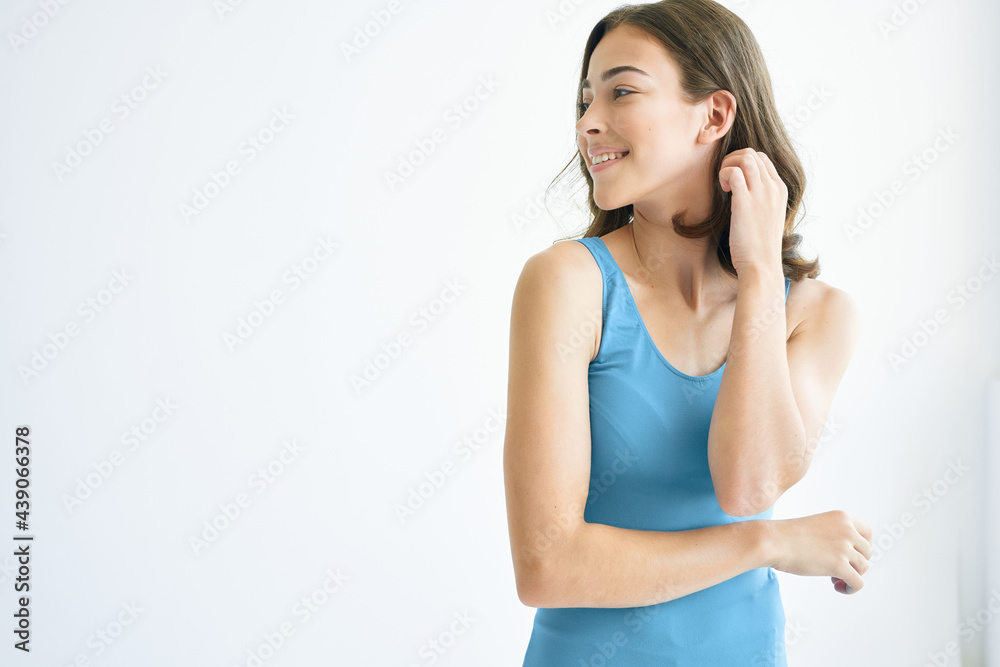 pretty brunette in blue t-shirt posing studio fashion hairstyle pretty brunette in blue t-shirt posing studio fashion hairstyle