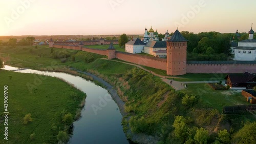 Monastery of Saint Euthymius in Suzdal, Russia. Aerial drone view at sunset. Famous landmark of the Golden Ring of Russia
 photo