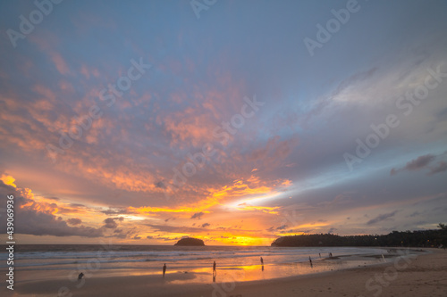 Scene of Colorful romantic sky sunset with Changing the color of the sky background . .beautiful cloud at sunset above island in nature and travel concept..