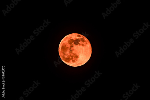 Full moon on dark night background