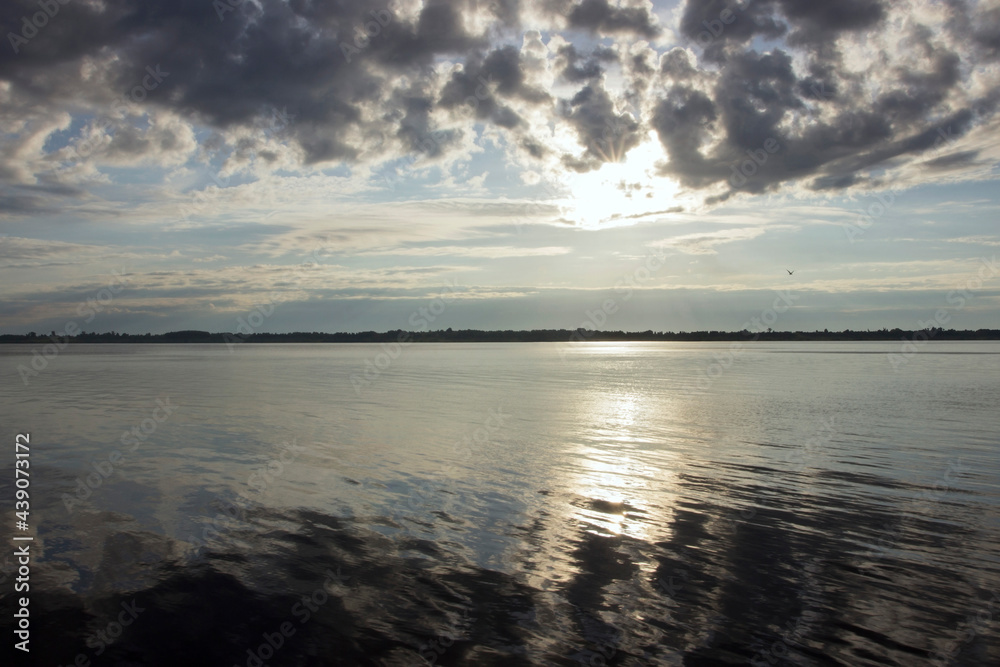 Fototapeta premium Morning landscape on the Volga river. Reflection of the sky in the water. Rssia.