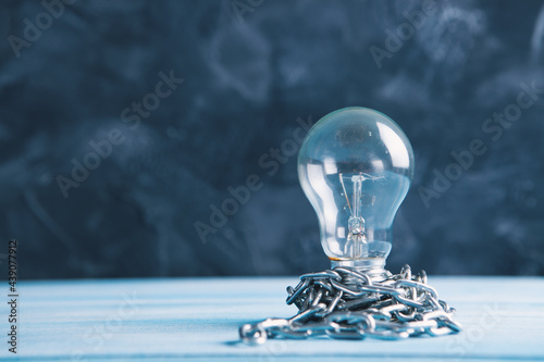 intellectual property. light bulb with chain photo