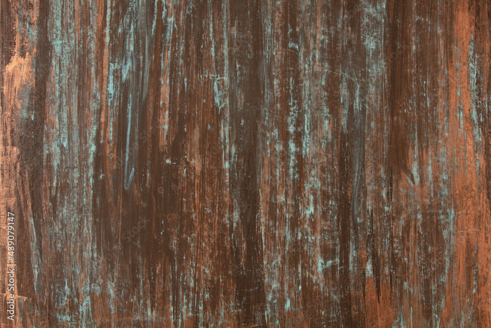 The texture of the copper background is covered with a blue patina The texture of the copper background is covered with a blue patina