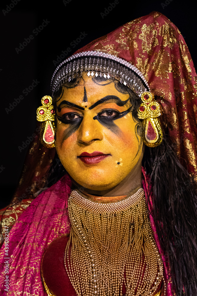 young artist facial expression in traditional costume of kathakali dance