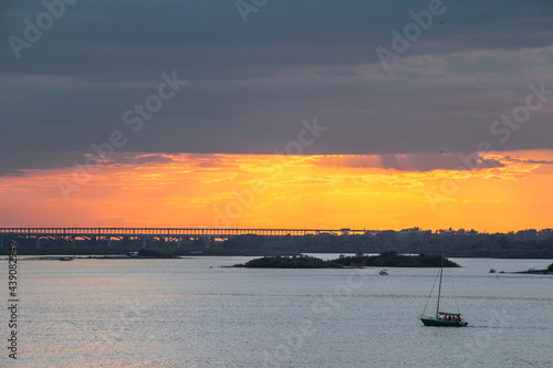 A lone boat at sunset