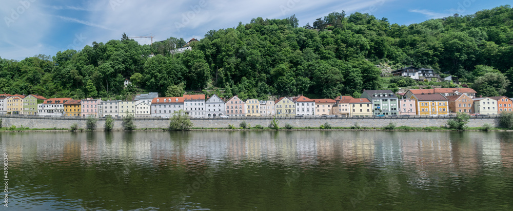 View of a row of houses across the Danube river in Passau
