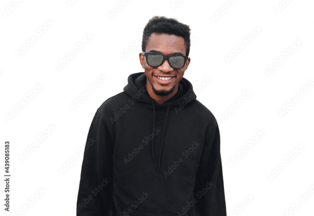 Portrait close up of happy smiling young african man wearing a blank black hoodie, sunglasses isolated on a white background Portrait close up of happy smiling young african man wearing a blank black hoodie, sunglasses isolated on a white background