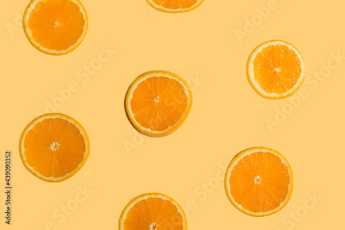 Orange cut in half on an orange background