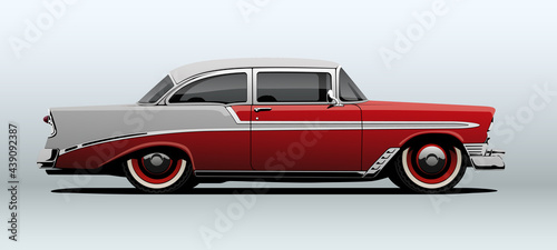 Red classic car, view from side, in vector.
