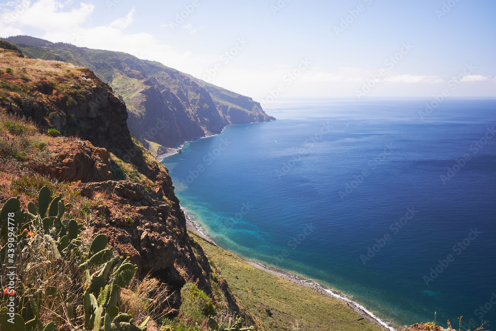 Landscape view with cliffs and ocean in Ponta Do Pargo, west of Madeira island, Portugal. Sunny day.