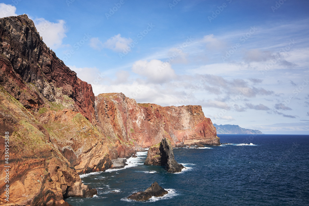 East Madeira coast landscape view with cliffs, rocks and sea. Atlantic ocean. Favorite touristic destination.