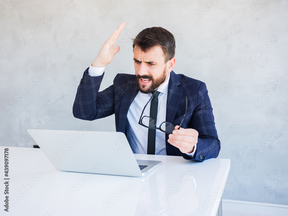 The businessman showing anxiety and dissatisfaction with the flow of communication. The businessman showing anxiety and dissatisfaction with the flow of communication.