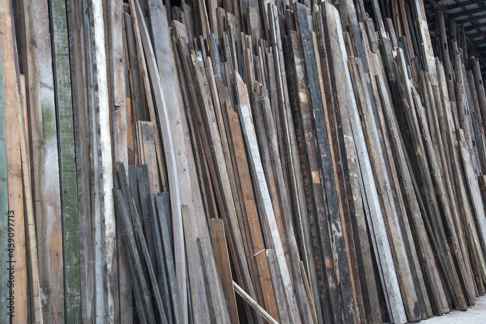 A pile of old wooden blocks material background A pile of old wooden blocks material background