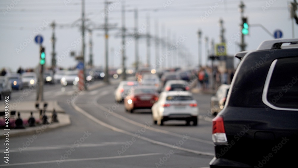 Many car moving on road city traffic. Congestion street cars. Morning traffic at street. Personal cars and taxis. Urban scene traffic road. Traffic lights. Blur