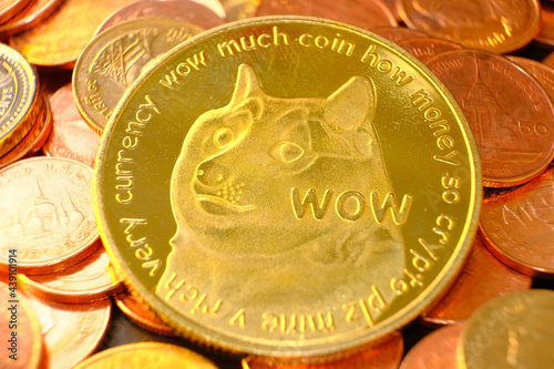 Dogecoin cryptocurrency on table and digital currency money concept, crypto market, cryptocurrency financial systems concept, Golden coin background photo