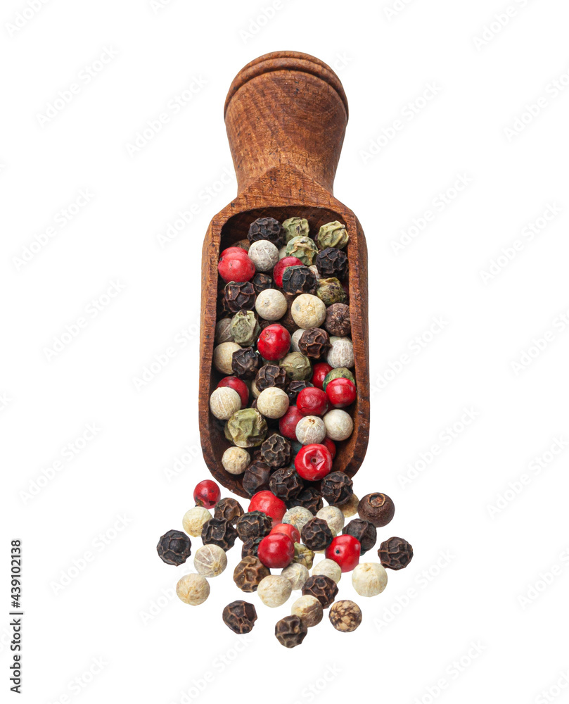 Pepper mix in scoop isolated on white background