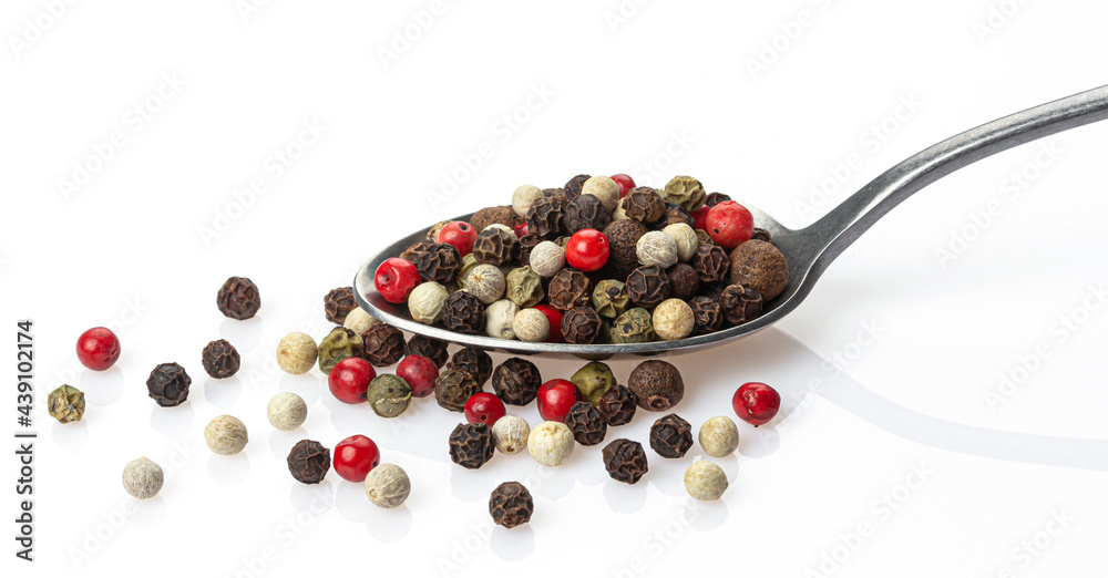 Pepper mix in spoon isolated on white background Pepper mix in spoon isolated on white background