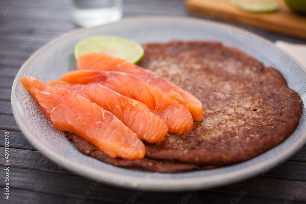 salted salmon fillet with buckwheat pancakes and lime salted salmon fillet with buckwheat pancakes and lime