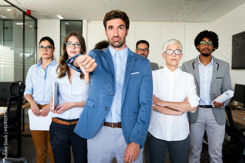 Group of unsuccessful business people and badly managed company leads to unhappiness