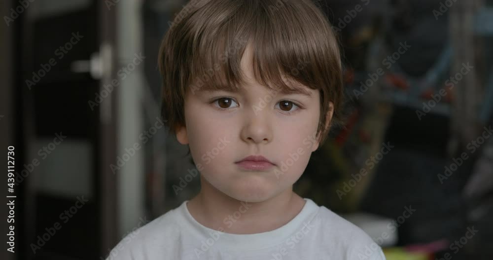 Portrait Little Child Boy Looking at Camera. Young Serious Thinking Curiosity Child Looking at Camera. Closeup. Indoors. Sad Kid Boy Portrait. Face Serious Contemplative Child. Portrait Little Child Boy Looking at Camera. Young Serious Thinking Curiosity Child Looking at Camera. Closeup. Indoors. Sad Kid Boy Portrait. Face Serious Contemplative Child.