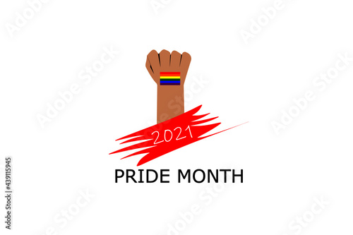 man's hand back side handful with small rainbow sticker on wrist the symbol of LGBQ community  equality movement, and text" 2021 PRIDE MONTH", concept for LGBTQ happy pride month in June