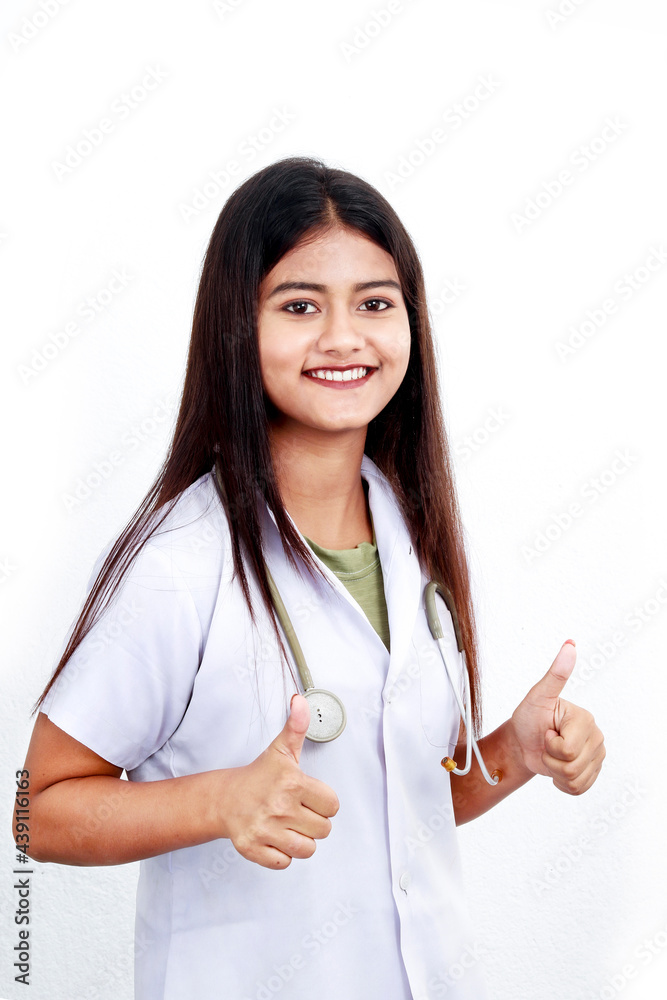 Profession healthcare people and medicine concept. Beautiful portrait friendly Asian female doctor or nurse smiling and showing thumbs up with stethoscope isolated on white background. Profession healthcare people and medicine concept. Beautiful portrait friendly Asian female doctor or nurse smiling and showing thumbs up with stethoscope isolated on white background.