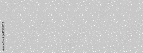 snowfall in grey sky, abstract snow background, christmas background in winter