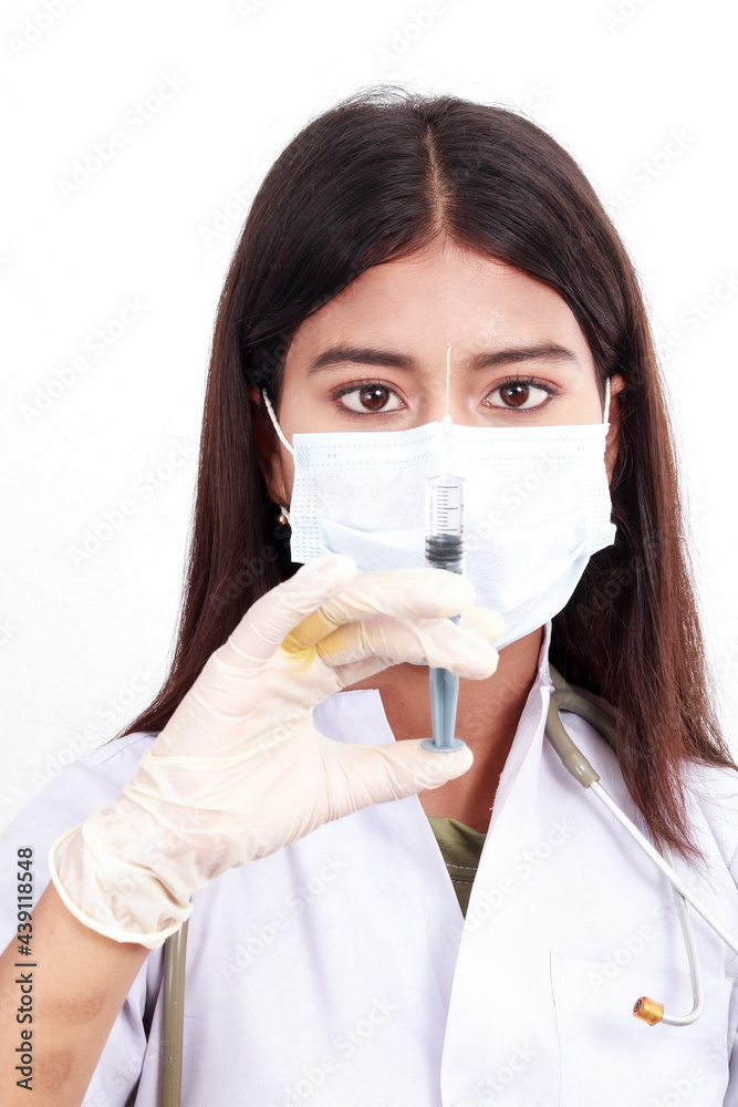 Selected focus Asian female doctor holding and looking Syringe for healthcare service