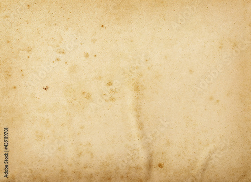 background of empty stained old paper, top view