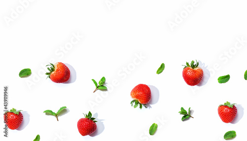 Fototapeta Naklejka Na Ścianę i Meble -  Fresh red strawberries with mints overhead view