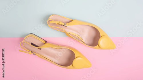 women's shoes on a multi-colored background, pastel colors.