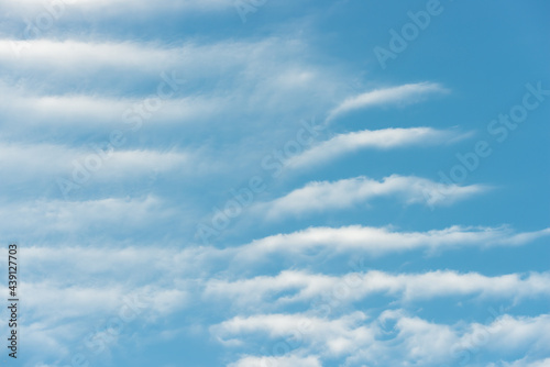 cirrocumulus clouds or high-altitude cloudlets photo
