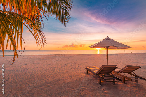 Amazing beach. Chairs on the sandy beach sea. Luxury summer holiday and vacation resort hotel for tourism. Inspirational tropical landscape. Tranquil scenery  relaxing beach  tropical landscape design